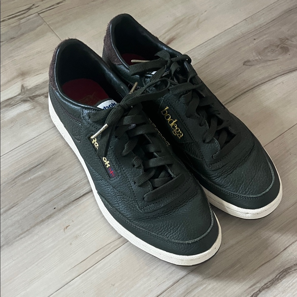 Reebok Black Leather Sneakers with Gold Accents
